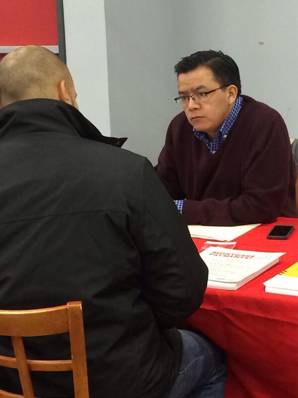 CNYCN's Rudy Ulin discusses the Housing Mobility Program with a homeowner