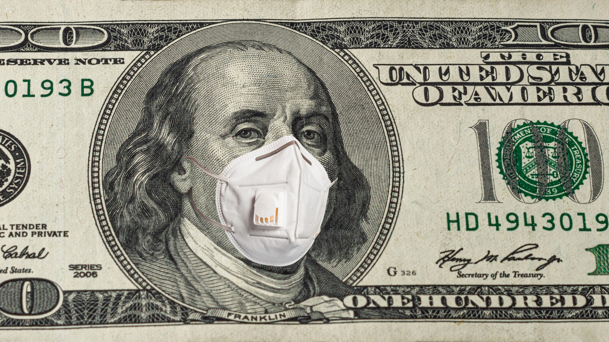 Face Of American President In Medical Mask On Dollar Bill During   IStock Money Covid Mask 2048x1152 